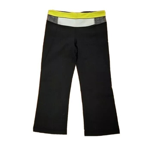 CLEARANCE!!! 💥 Lululemon Size 6 Black Slit Back Flared Yoga Capri Pants - Picture 1 of 11